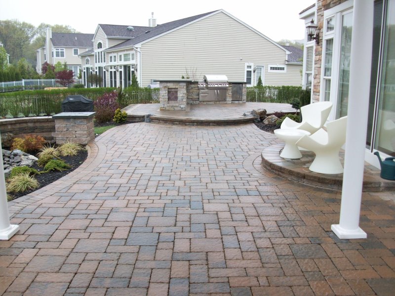 backyard entertaining area with patio and kitchen